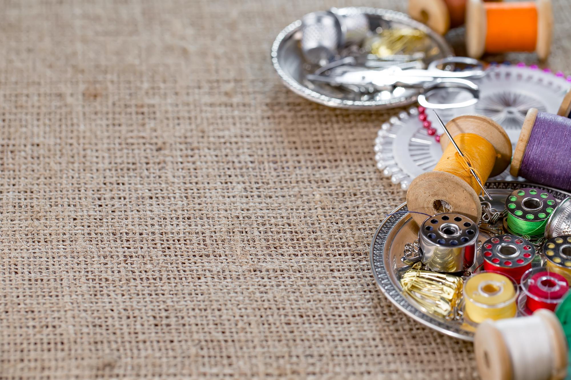 atelier workspace with fabrics and threads